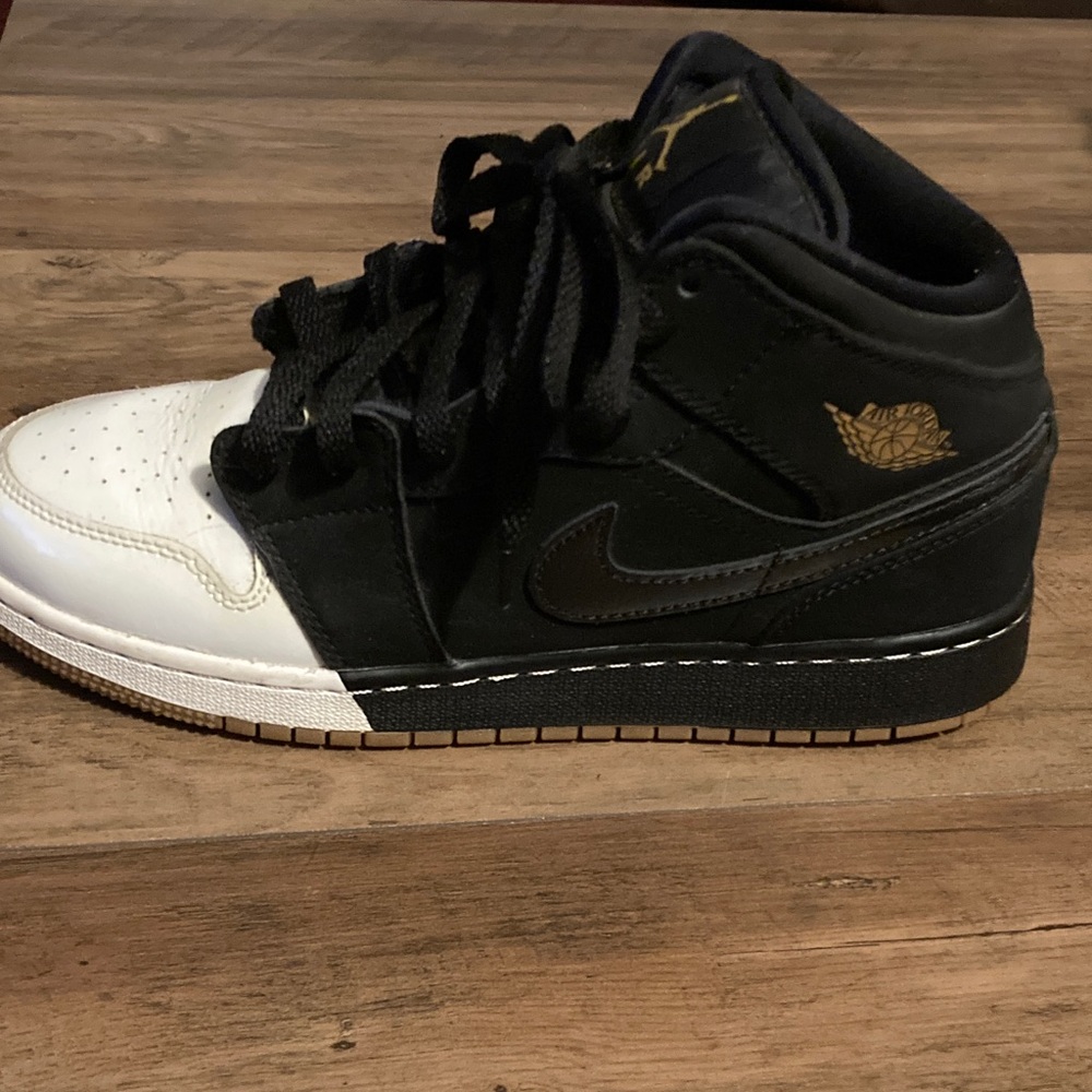 Jordan Kids Black and White Sneakers with Gold Accents